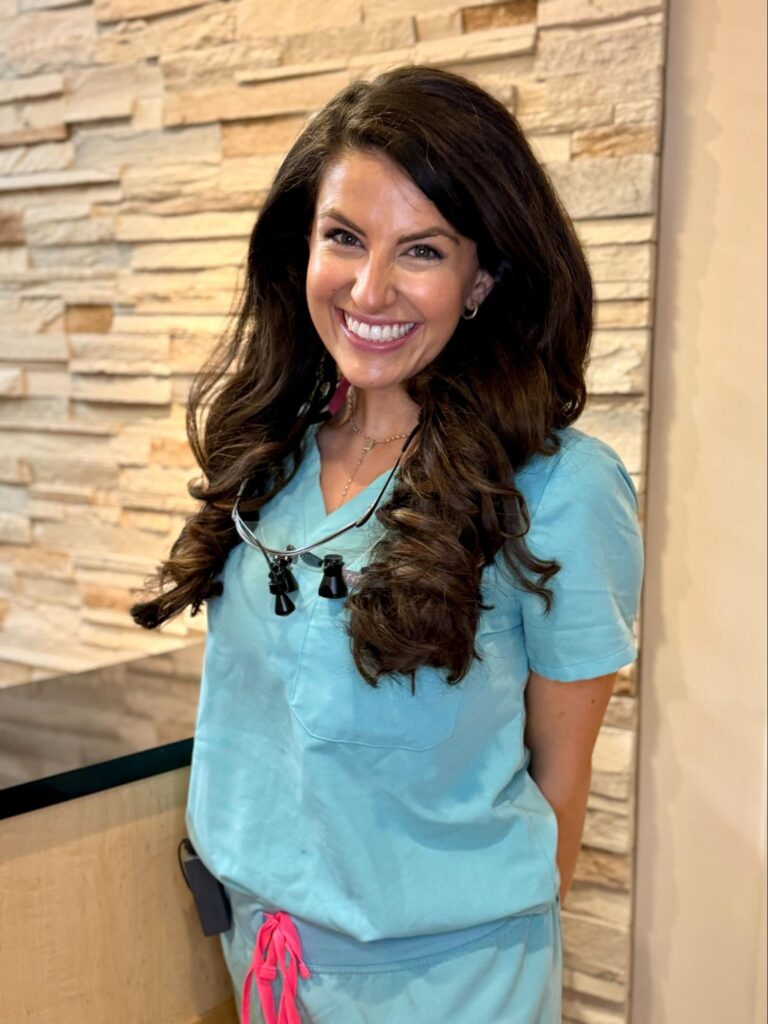 Dr. Mary Margaret Kratz, pediatric dentist in St. Louis, smiling warmly at Little Pearls Pediatric Dentistry.